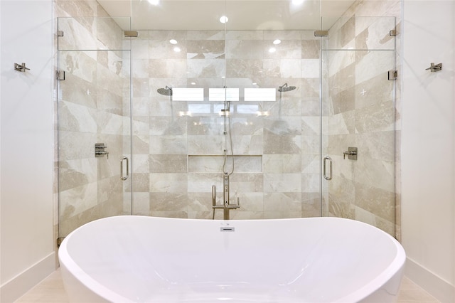 1570 Cheshire Ln, Houston, TX 77018 - bathroom featuring a shower stall, a soaking tub, baseboards, and recessed lighting