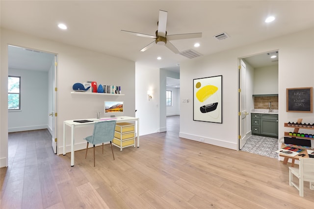 1570 Cheshire Ln, Houston, TX 77018 - office featuring a sink, ceiling fan, light wood-style flooring, recessed lighting, and baseboards