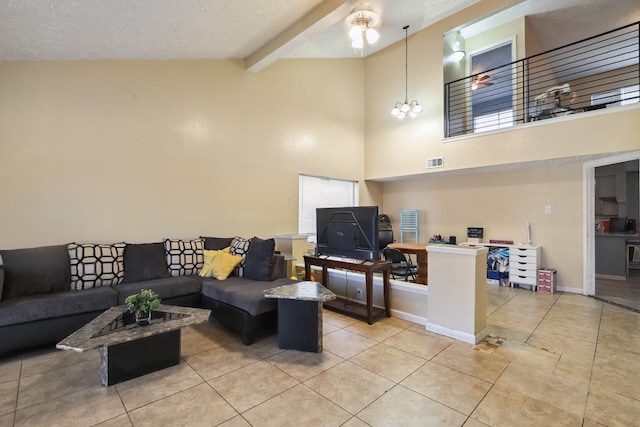 1858 Wood Orchard Dr, Missouri City, TX 77489 - tiled living area featuring beamed ceiling, visible vents, baseboards, a ceiling fan, and high vaulted ceiling