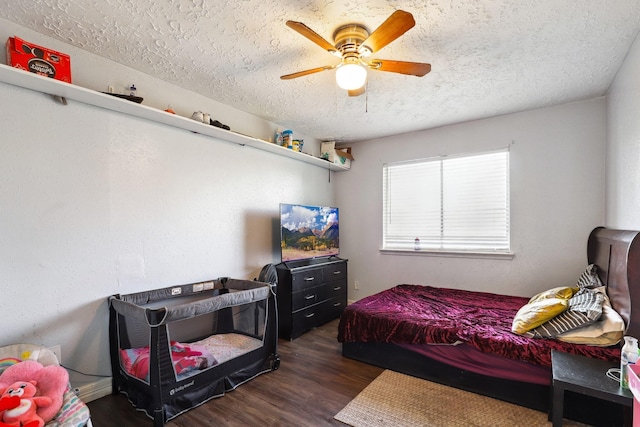 1858 Wood Orchard Dr, Missouri City, TX 77489 - bedroom with a textured ceiling, wood finished floors, and ceiling fan