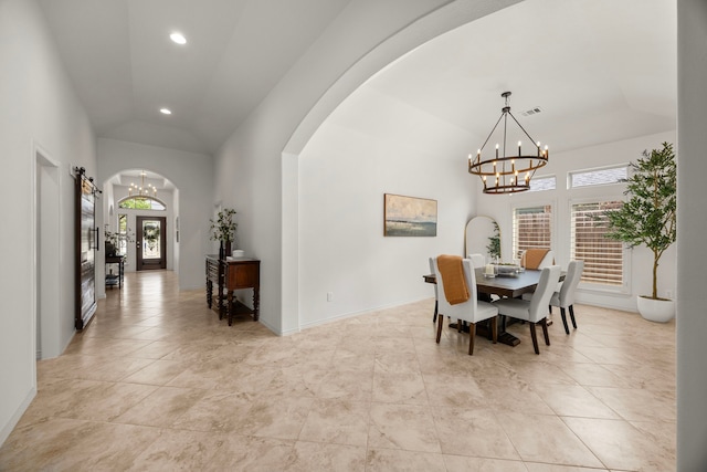 29119 Marina Point Ln, Fulshear, TX 77441 - dining space with a chandelier, vaulted ceiling, arched walkways, plenty of natural light, and recessed lighting