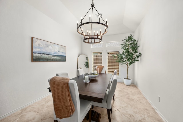 29119 Marina Point Ln, Fulshear, TX 77441 - dining room featuring a chandelier, vaulted ceiling, light tile patterned floors, and baseboards