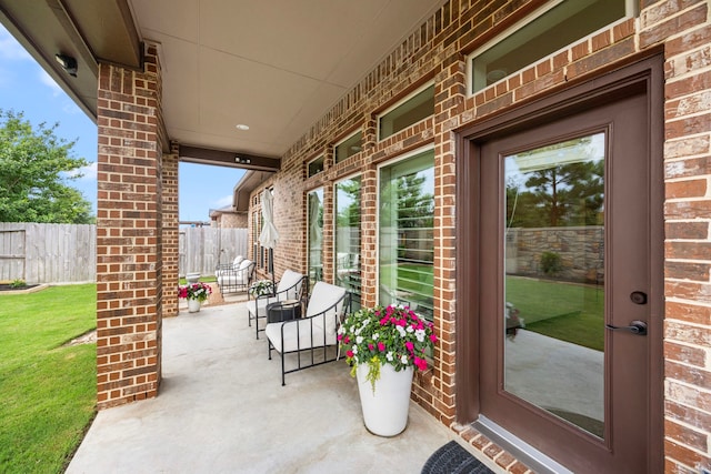 29119 Marina Point Ln, Fulshear, TX 77441 - view of patio / terrace featuring fence
