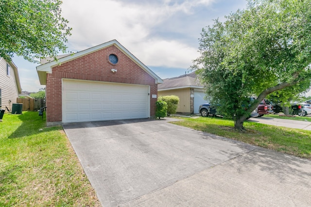 view of front of property featuring central AC unit, a front lawn, an outbuilding, brick siding, and a garage