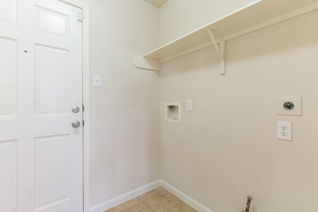 laundry area featuring electric dryer hookup, light tile patterned flooring, baseboards, laundry area, and washer hookup