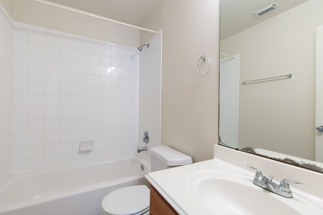 bathroom featuring shower / bathtub combination, visible vents, vanity, and toilet