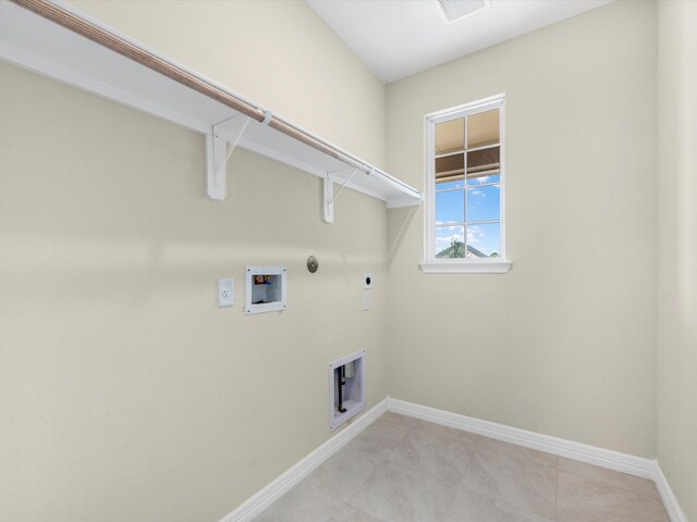 21719 White Bellflower Ln, Cypress, TX 77433 - washroom featuring electric dryer hookup, laundry area, baseboards, hookup for a gas dryer, and washer hookup