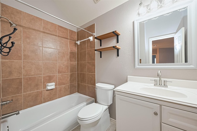 bathroom with toilet, vanity, and shower / washtub combination