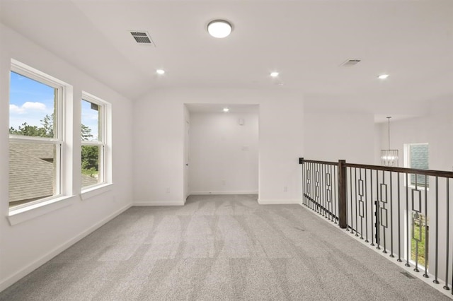 122 Canary Island Cir, Montgomery, TX 77316 - spare room featuring a chandelier, recessed lighting, and light carpet