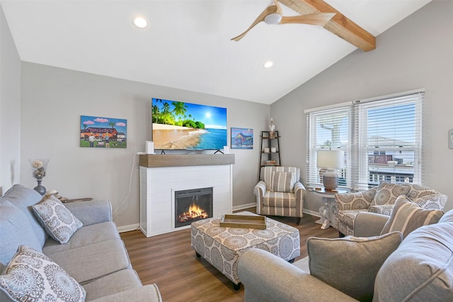 16605 Flounder Way, Jamaica Beach, TX 77554 - living area with wood finished floors, baseboards, recessed lighting, and a lit fireplace