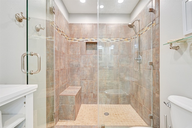 16605 Flounder Way, Jamaica Beach, TX 77554 - bathroom with a shower stall, toilet, and recessed lighting