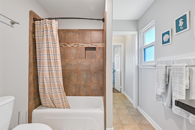 16605 Flounder Way, Jamaica Beach, TX 77554 - full bath with tile patterned flooring, shower / bath combo, and toilet
