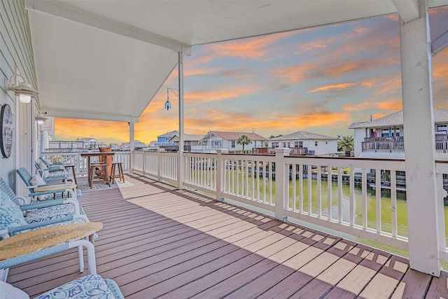 16605 Flounder Way, Jamaica Beach, TX 77554 - deck featuring a water view and a residential view