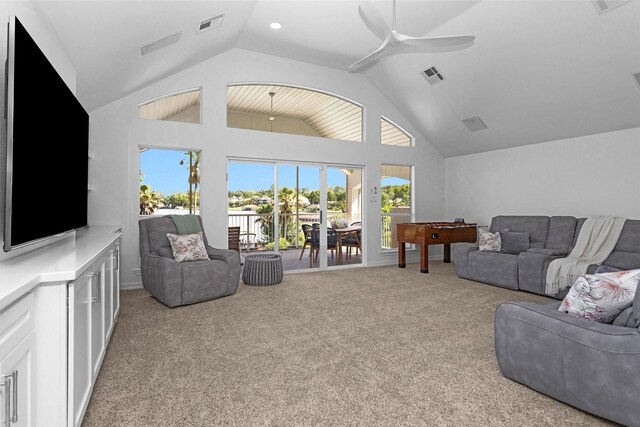 16059 Walden Rd, Conroe, TX 77356 - living area featuring ceiling fan, lofted ceiling, carpet, and visible vents
