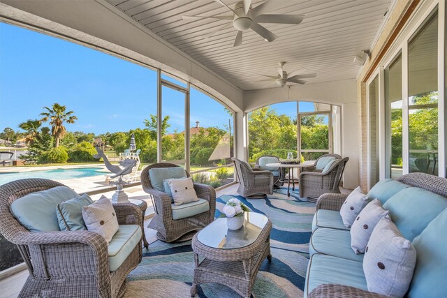 16059 Walden Rd, Conroe, TX 77356 - sunroom / solarium featuring ceiling fan and outdoor lounge area
