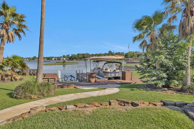 16059 Walden Rd, Conroe, TX 77356 - dock area featuring boat lift, a yard, and a water view