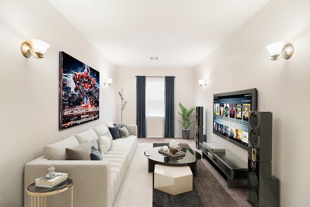 carpeted living area with visible vents