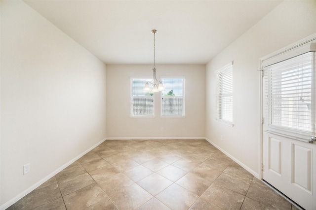 unfurnished dining area with baseboards, an inviting chandelier, and light tile patterned flooring