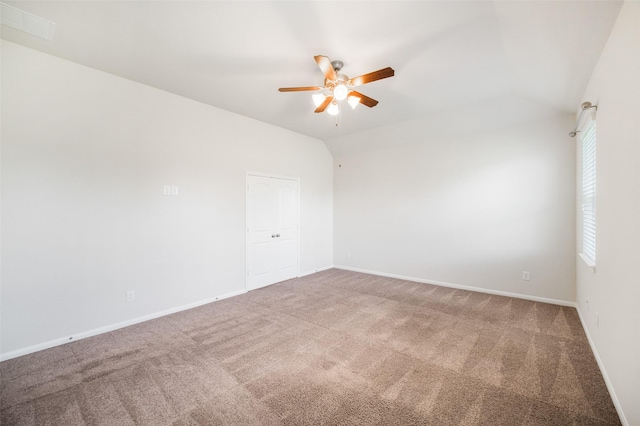 unfurnished room with baseboards, a ceiling fan, and carpet flooring