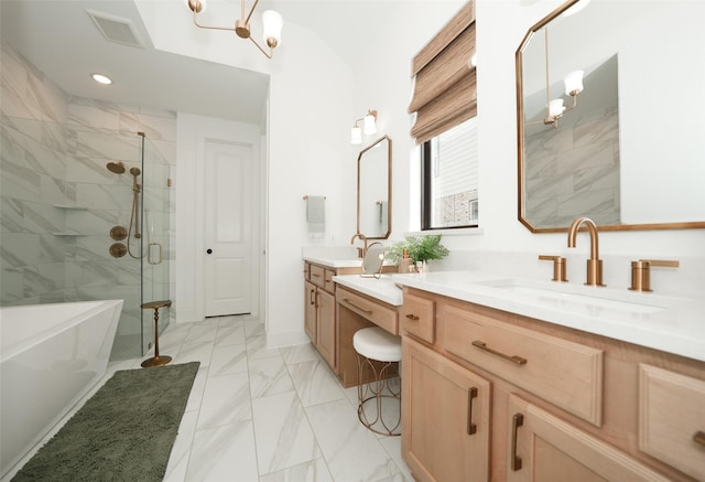 14924 Scarlet Branch Dr, Conroe, TX 77302 - bathroom featuring a sink, a stall shower, marble finish floor, a soaking tub, and visible vents
