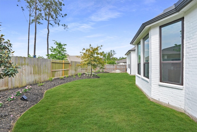 14924 Scarlet Branch Dr, Conroe, TX 77302 - view of yard with a fenced backyard