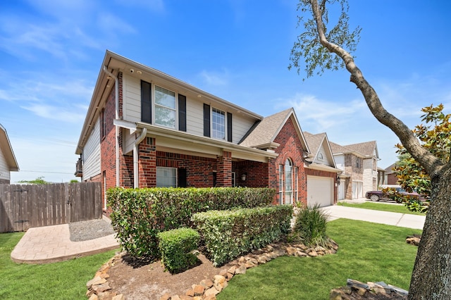 14911 Hurst Point Ln, Houston, TX 77049 - traditional-style house with brick siding, concrete driveway, and a garage