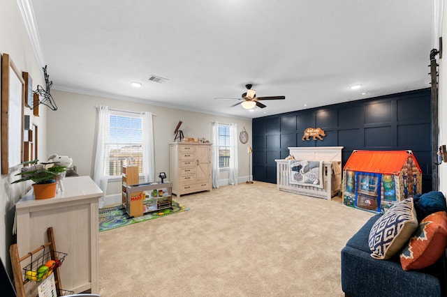 14911 Hurst Point Ln, Houston, TX 77049 - playroom featuring crown molding, a ceiling fan, recessed lighting, light carpet, and baseboards
