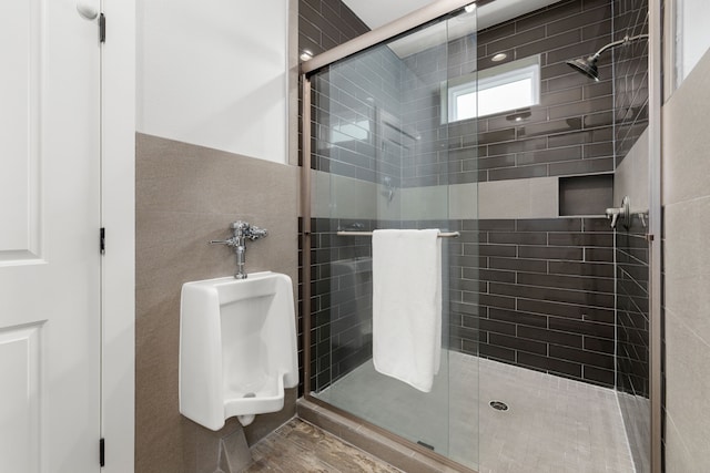 bathroom with a shower stall