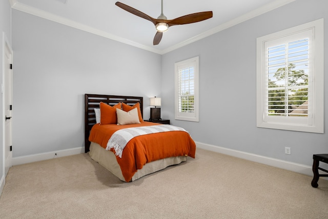 bedroom featuring baseboards, carpet flooring, and ornamental molding
