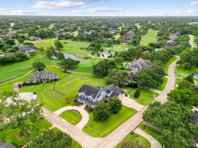 bird's eye view featuring a residential view, golf course view, and a water view