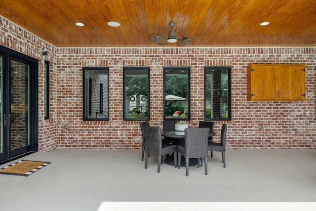 view of patio featuring outdoor dining space and a ceiling fan