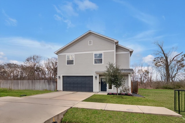 traditional-style house featuring an attached garage, a front lawn, driveway, and fence
