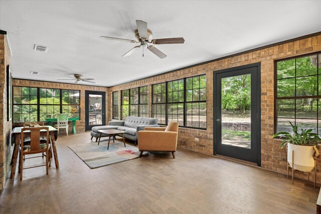 1492 Sleepy Hollow Ln, Canton, TX 75103 - sunroom with an outdoor living space, wood finished floors, a ceiling fan, and visible vents