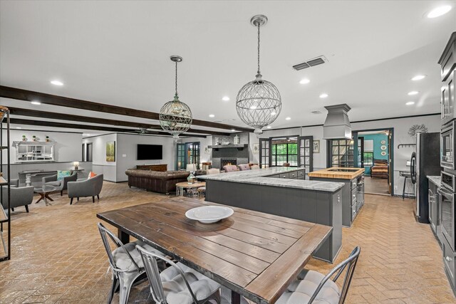1492 Sleepy Hollow Ln, Canton, TX 75103 - dining room with visible vents, brick floor, recessed lighting, and beamed ceiling