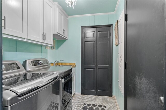 1492 Sleepy Hollow Ln, Canton, TX 75103 - laundry area with light tile patterned floors, separate washer and dryer, a sink, ornamental molding, and cabinet space