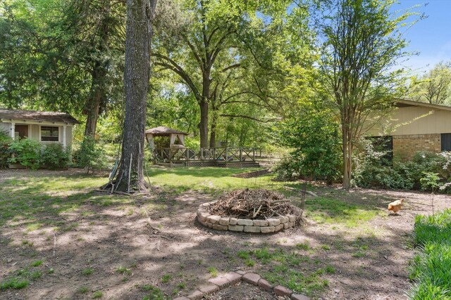1492 Sleepy Hollow Ln, Canton, TX 75103 - view of yard featuring a wooden deck, an outdoor fire pit, and a gazebo