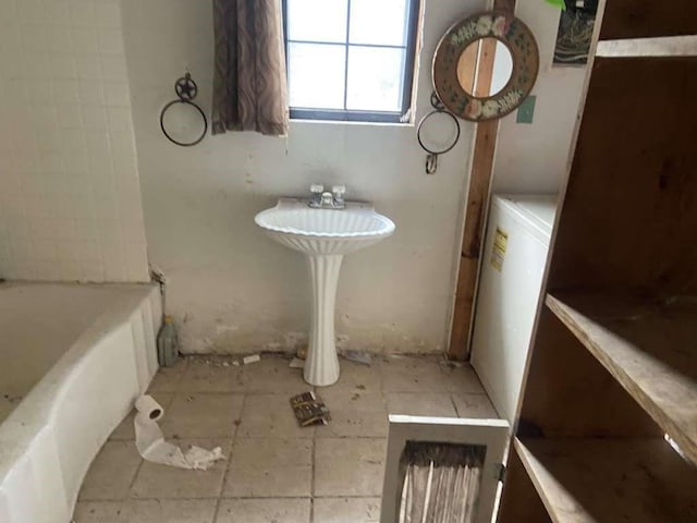bathroom with a bath