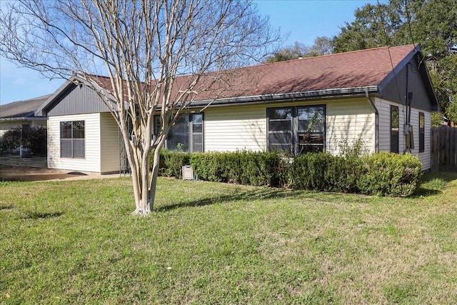 exterior space featuring a front lawn
