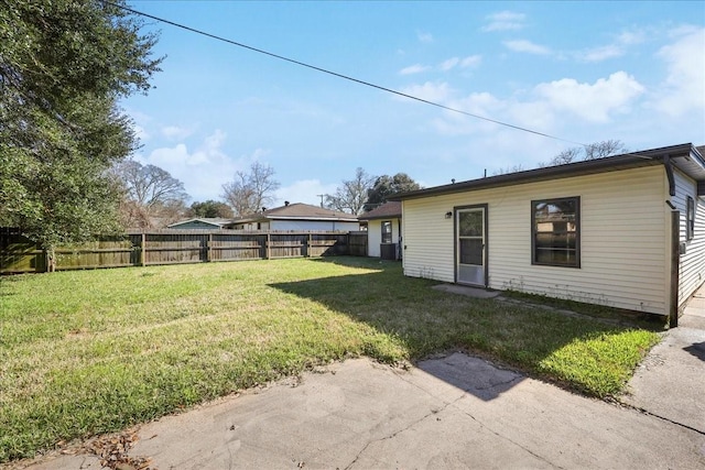 view of yard featuring a fenced backyard
