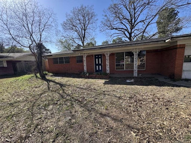 1716 S Robison Rd, Texarkana, TX 75501 - view of front of house with brick siding and fence
