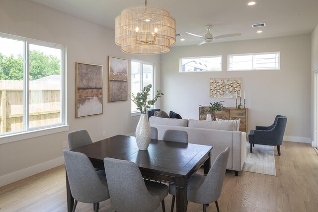 1810 Yates St, Houston, TX 77020 - dining space with plenty of natural light, a chandelier, light wood finished floors, and recessed lighting