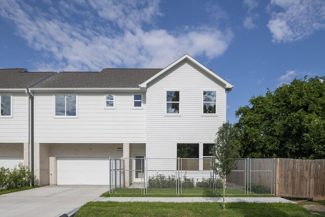 1810 Yates St, Houston, TX 77020 - multi unit property featuring fence, driveway, a garage, and a shingled roof
