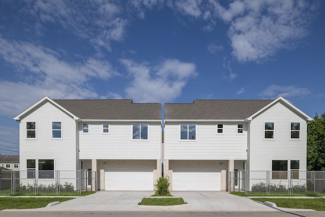 1810 Yates St, Houston, TX 77020 - view of front of home featuring driveway, a garage, and fence