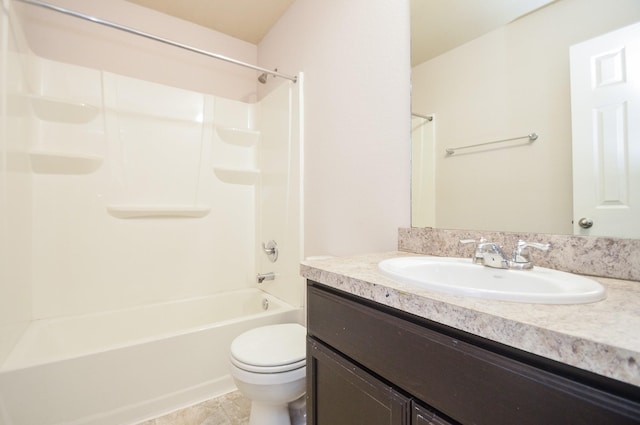 full bathroom featuring tile patterned flooring, shower / washtub combination, toilet, and vanity