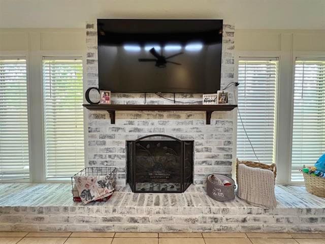 210 Glenbrook St, Vidor, TX 77662 - details featuring a fireplace and ceiling fan
