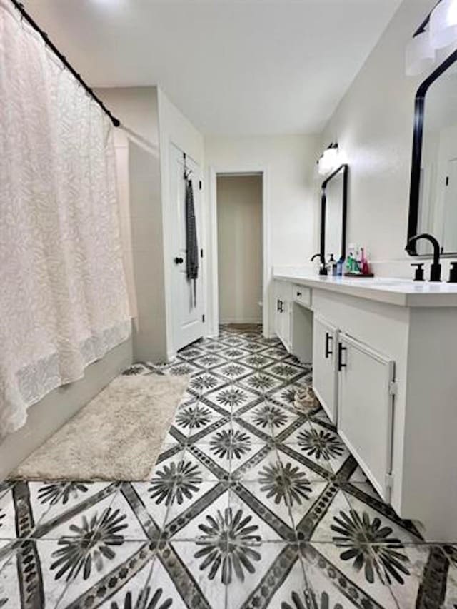 210 Glenbrook St, Vidor, TX 77662 - full bath featuring tile patterned floors, vanity, and shower / bathtub combination with curtain