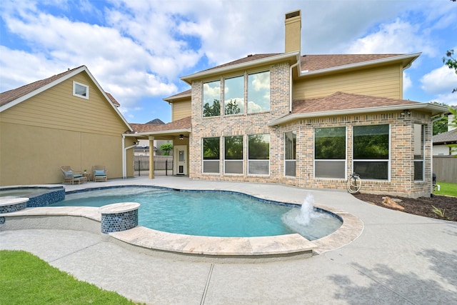 314 Del Monte Dr, Friendswood, TX 77546 - view of pool featuring fence, a pool with connected hot tub, and a patio