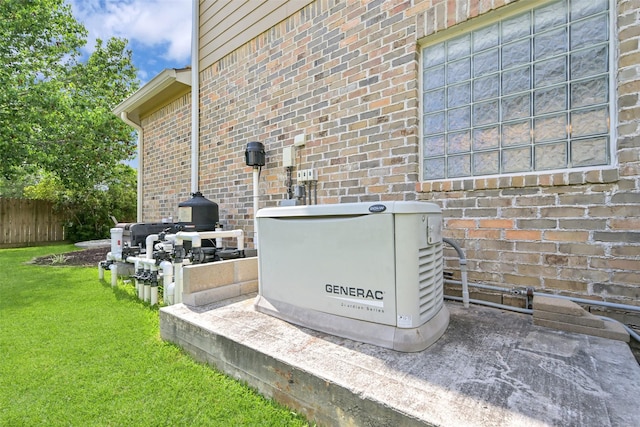 314 Del Monte Dr, Friendswood, TX 77546 - details with a power unit, a wood stove, fence, and brick siding