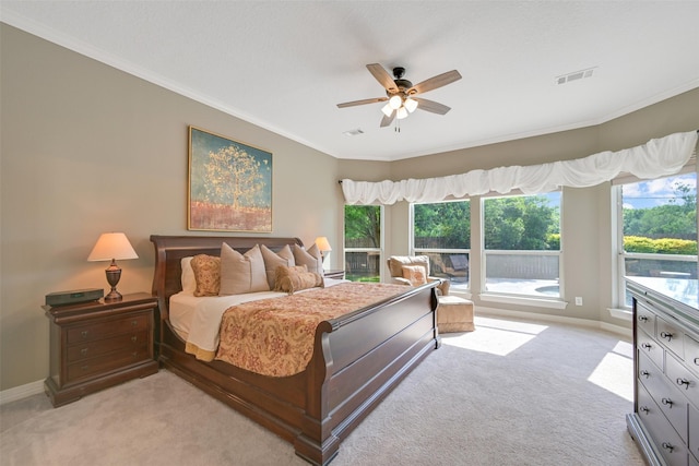 314 Del Monte Dr, Friendswood, TX 77546 - bedroom featuring light carpet, baseboards, visible vents, and crown molding