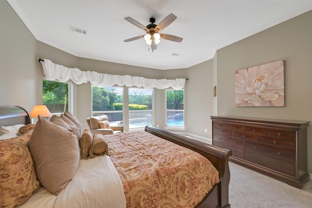 314 Del Monte Dr, Friendswood, TX 77546 - carpeted bedroom featuring ceiling fan, baseboards, crown molding, and visible vents